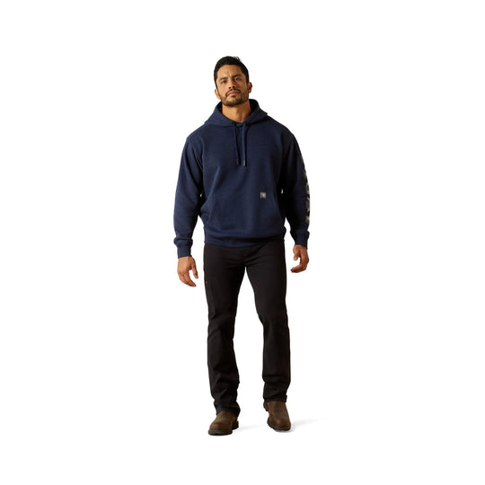Navy hooded pullover sweatshirt with a front kangaroo pocket and drawstrings, worn with black pants and brown boots