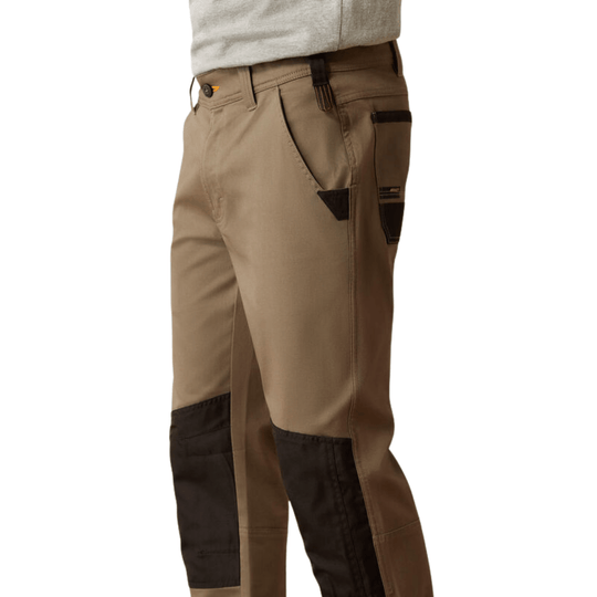 Tan and brown cargo pants with black knee panels and side pocket details