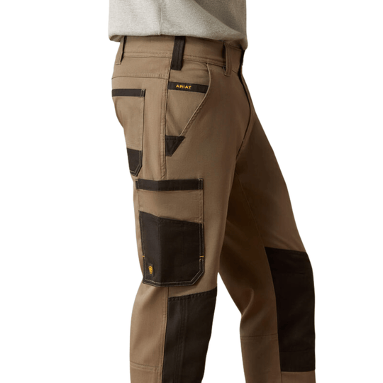Tan work cargo pants with black reinforced knee and pocket panels, shown from the side
