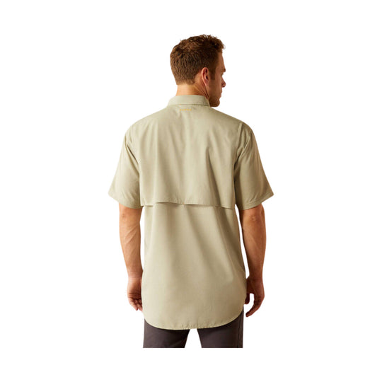 Light tan short-sleeve button-up work shirt shown from the back on a model