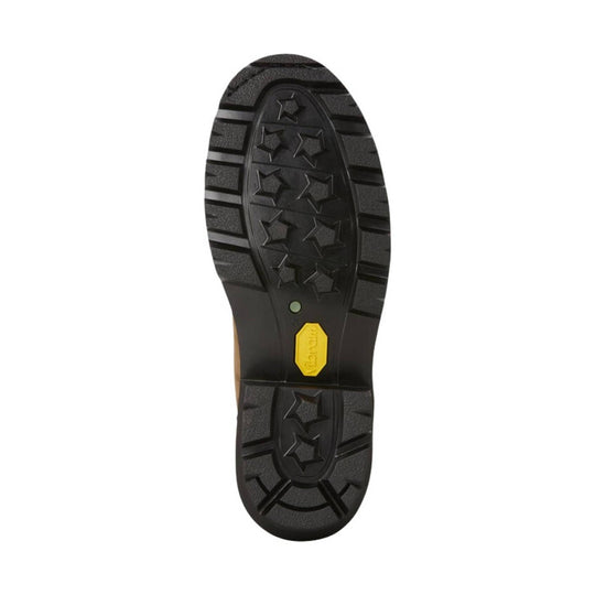 Black boot outsole with star-shaped tread and a yellow Vibram insert