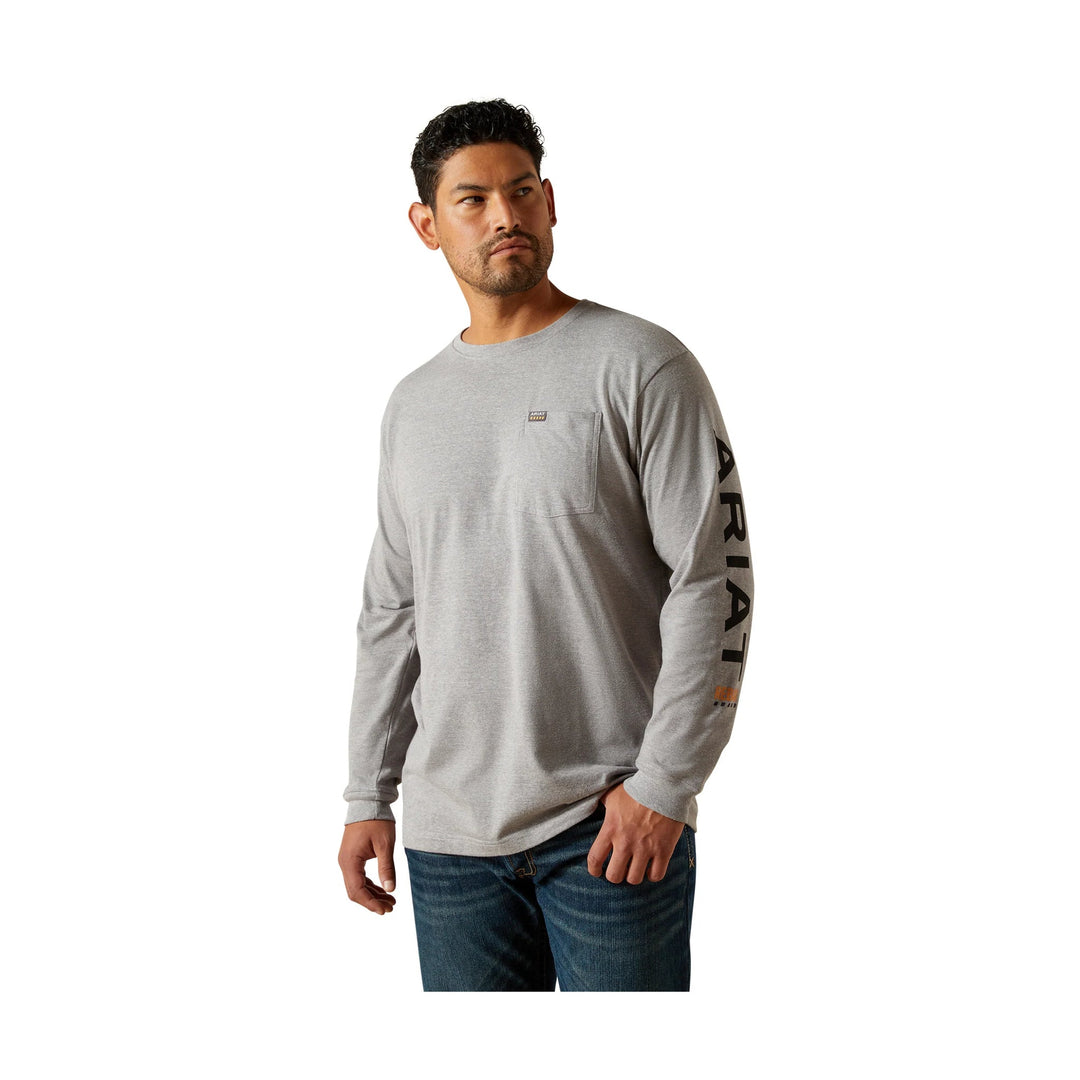 Gray long-sleeve crewneck shirt with a chest pocket and black sleeve lettering.