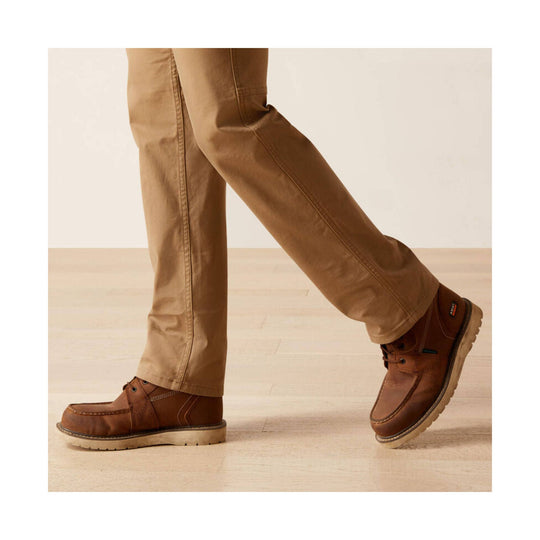 Khaki straight-leg pants with brown moc-toe work shoes