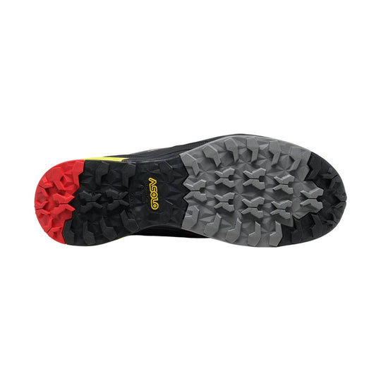 Hiking shoe outsole with black and gray tread and a red heel section