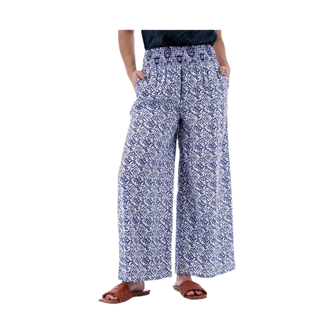 Blue-and-white patterned wide-leg palazzo pants with smocked elastic waistband and side pockets