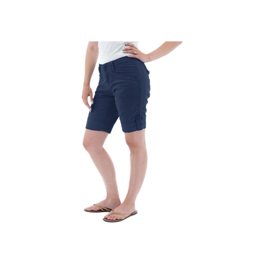 Navy roll-up cargo shorts worn with a white top and tan flip-flops