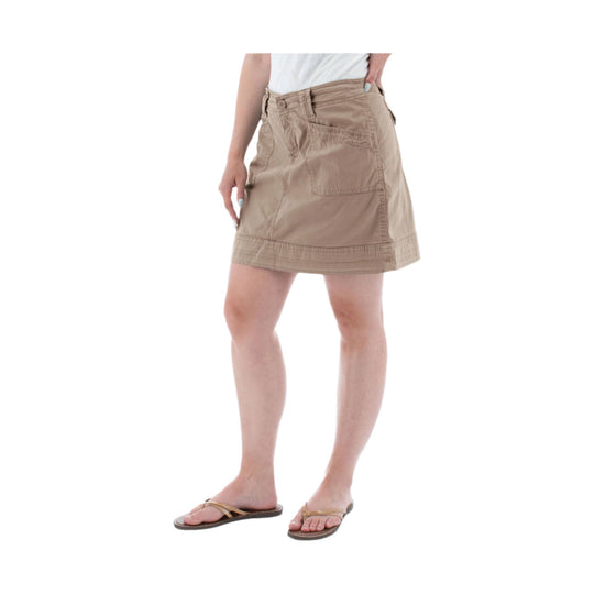 Tan woven skort with front patch pocket and wide hem, shown with a white top and sandals