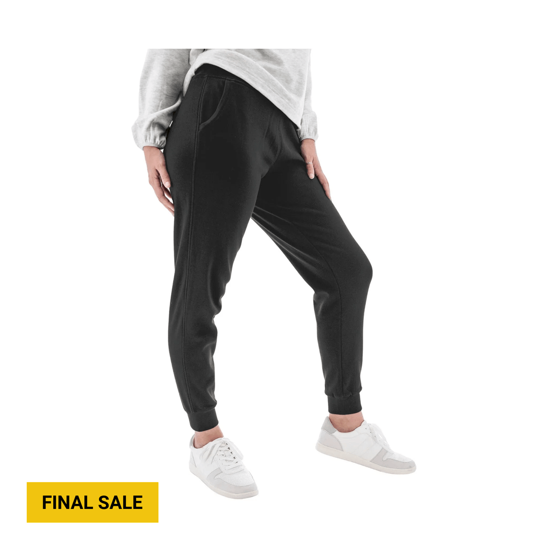 Black jogger pants on a model with ribbed cuffs and side pockets, with a FINAL SALE label