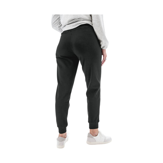 Black fleece joggers shown from the back with tapered legs and elastic cuffs