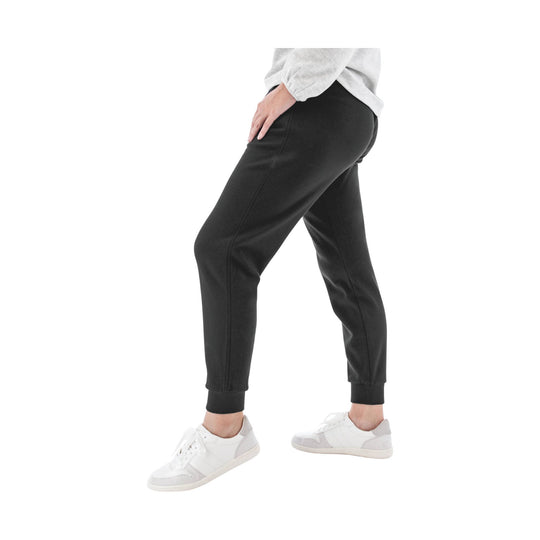 Black jogger pants with tapered legs and ribbed cuffs, worn with white sneakers
