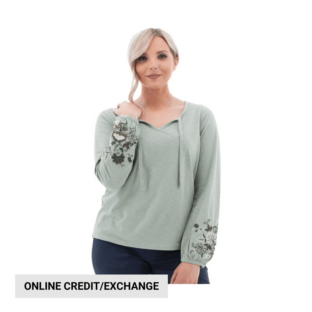 Light sage long-sleeve top with floral embroidered sleeves and a scoop neckline