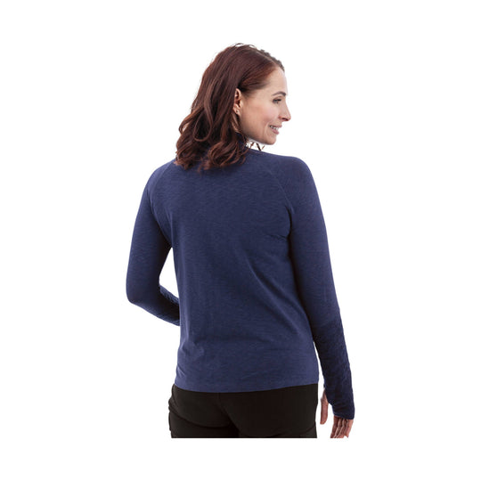Woman wearing a navy long-sleeve athletic pullover, shown from the back