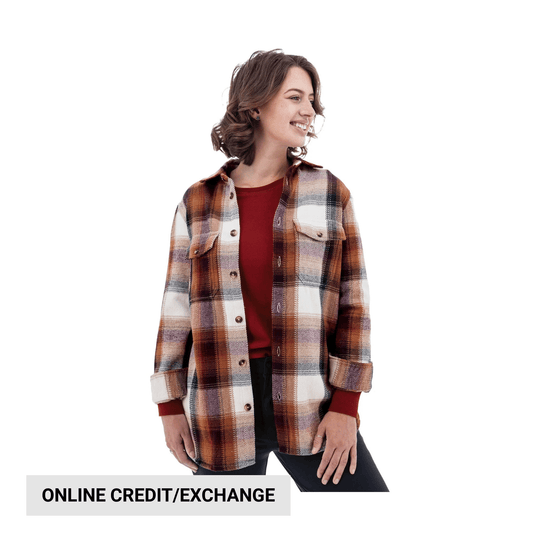 Woman wearing a brown-and-cream plaid button-up shirt over a red top, with visible text reading ONLINE CREDIT/EXCHANGE