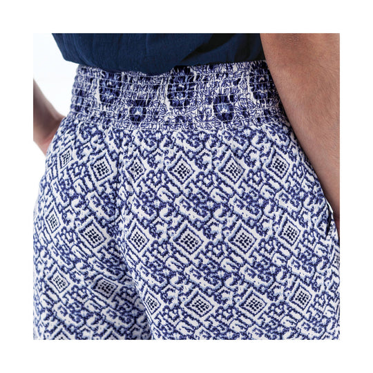 Blue and white patterned smocked-waist palazzo pants