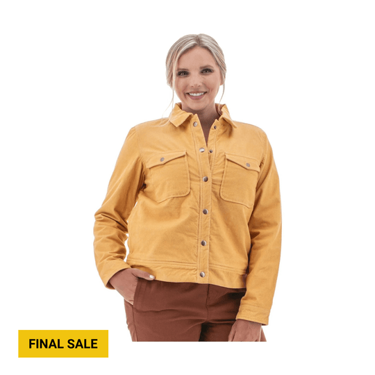 Mustard yellow snap-front jacket with flap chest pockets, paired with brown pants