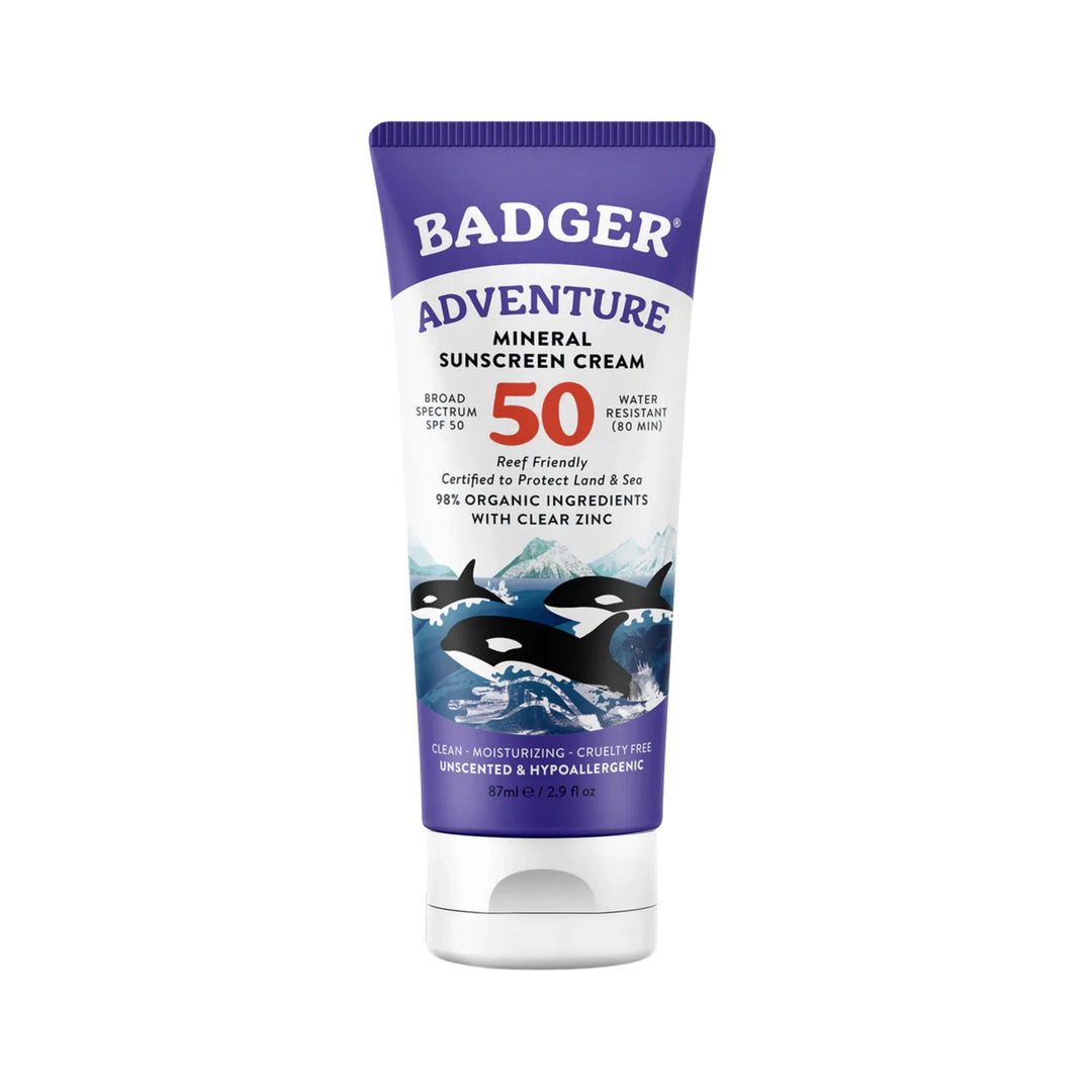 Purple and white mineral sunscreen tube with orca artwork, SPF 50, water resistant, 87 ml