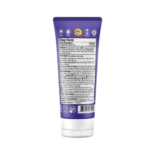 Back of a purple sunscreen tube with a Drug Facts label and barcode