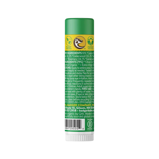Green balm stick with a yellow label and white cap