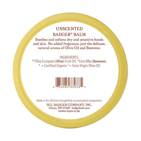 Round tin lid label for unscented balm with ingredients, barcode, and brown text on a white background