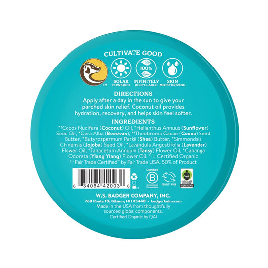 Turquoise round tin lid with text, eco icons, barcode, and ingredient list