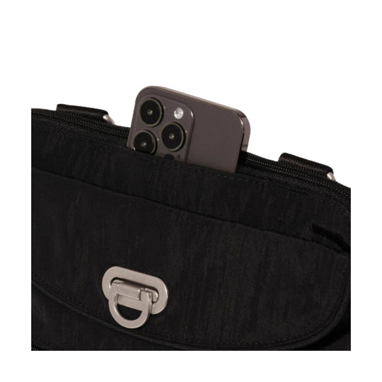 Black crossbody bag with a flap clasp and a smartphone peeking out of the top zip pocket