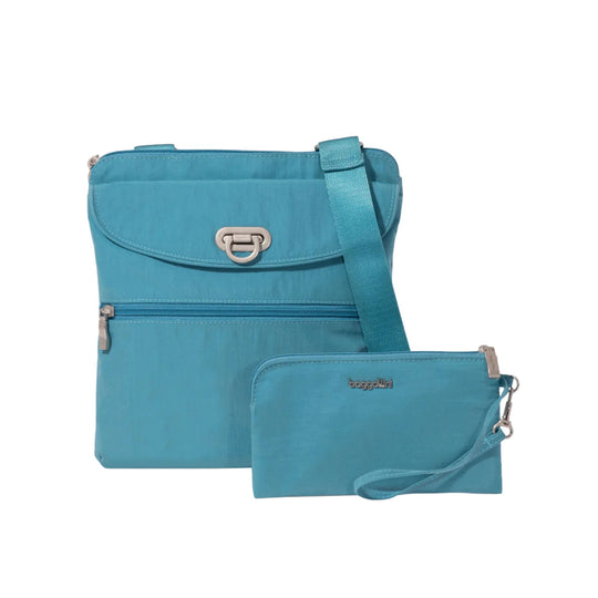 Teal crossbody bag with front flap pocket, zippered section, and matching pouch