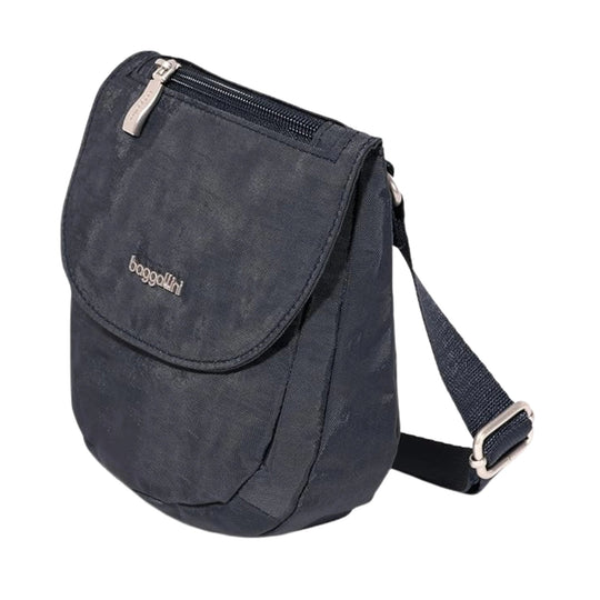 Small navy crossbody bag with flap front pocket, top zipper, and adjustable strap