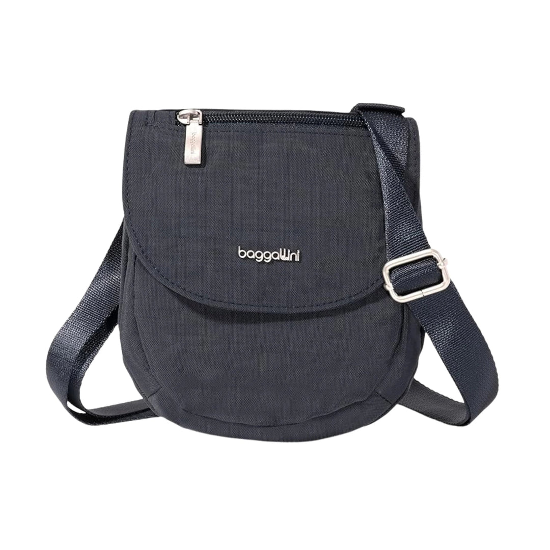 Dark navy crossbody bag with flap front pocket, top zipper, and adjustable shoulder strap
