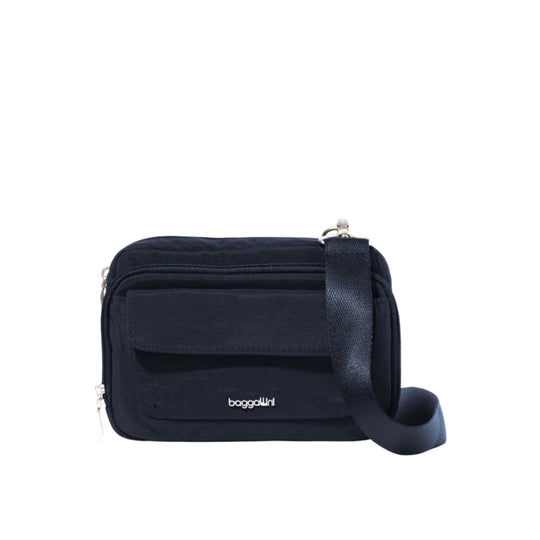 Black rectangular crossbody bag with front flap pocket, zippered compartments, and a wide shoulder strap