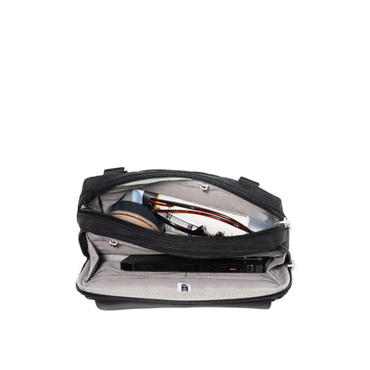 Open black zippered crossbody bag showing a gray interior with glasses, a compact case, and a phone
