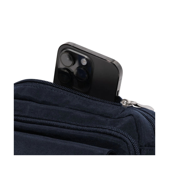 Dark navy zippered crossbody bag with a black smartphone partly sticking out of the top pocket