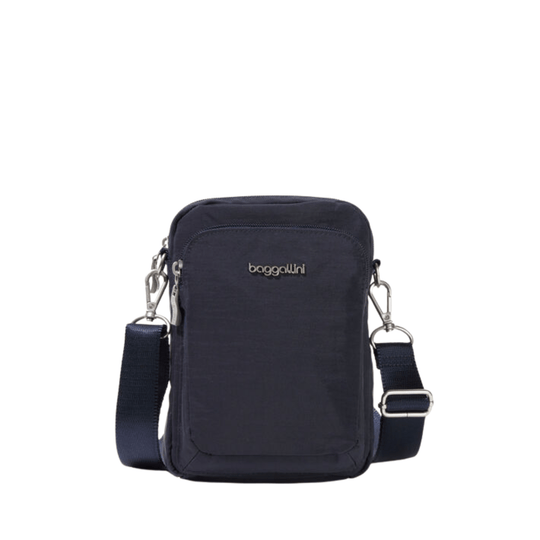 Navy rectangular crossbody bag with front zip pocket, adjustable strap, and small logo on the front