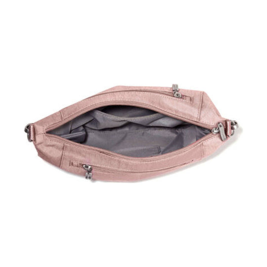 Pink half-moon crossbody bag with gray lining and multiple zippered pockets, shown open