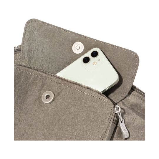 Taupe canvas waist pack with a phone partly tucked into the front pocket