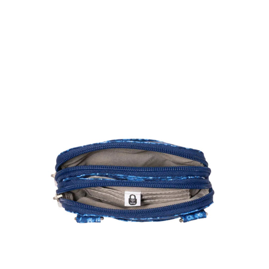 Blue zippered crossbody bag opened to show the interior lining and RFID tag