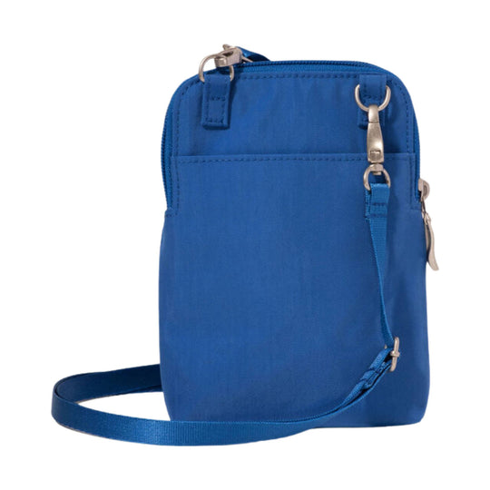Blue crossbody bag with zip closure, front pockets, and adjustable strap