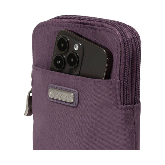 Purple small crossbody phone bag with front pocket and zipper closure