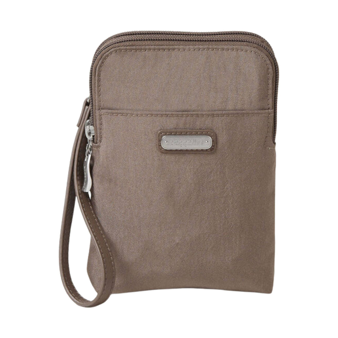 Brown wristlet crossbody pouch with front zip pocket and wrist strap