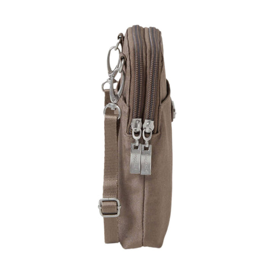 Small taupe crossbody bag shown from the side with dual zippers, a shoulder strap, and metal clips.
