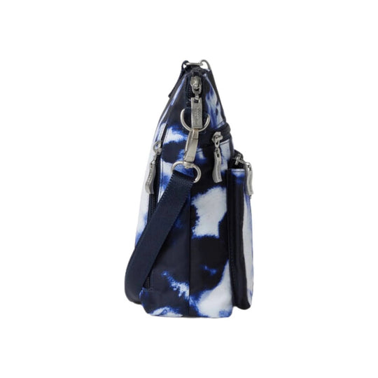 Small navy, white, and black crossbody bag with multiple zip pockets and a striped shoulder strap