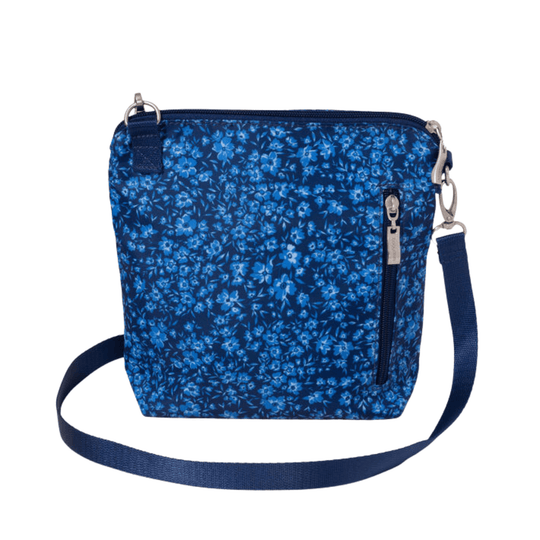 Blue floral crossbody bag with front zipper pocket and adjustable strap