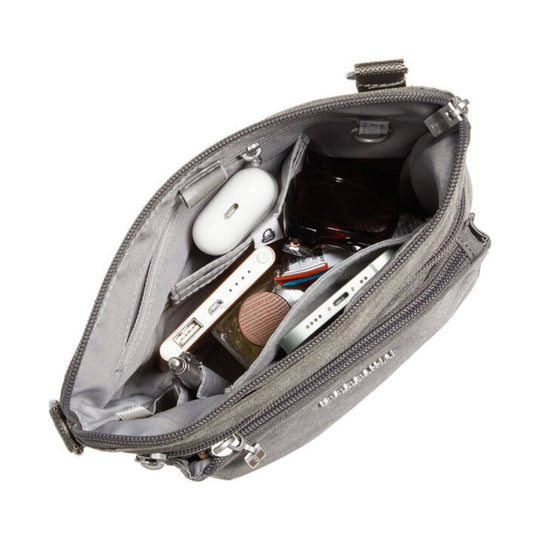 Gray zippered crossbody bag with multiple pockets, shown open with wallet, earbuds, phone, and other items inside