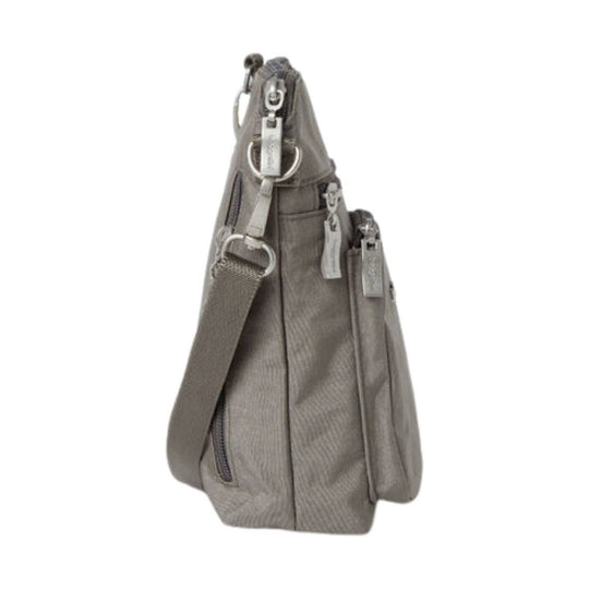 Gray crossbody handbag with multiple zip pockets and an adjustable shoulder strap