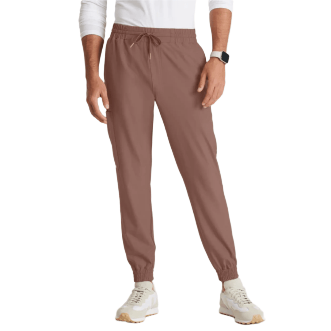 Brown jogger scrub pants with elastic cuffs and drawstring waist