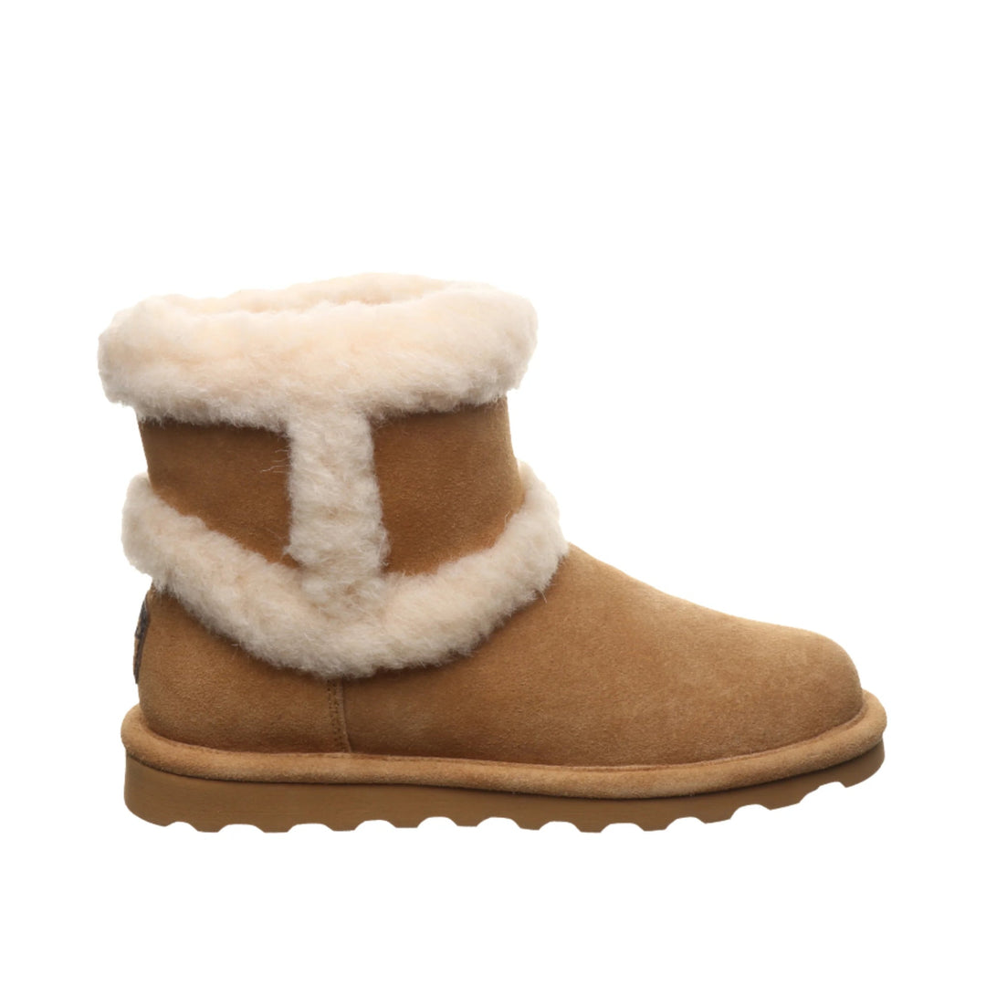 Tan suede boot with white faux-fur trim and cuff, shown in side view
