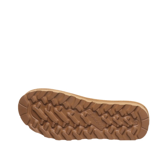 Tan boot sole with deep lug tread and BEARPAW branding