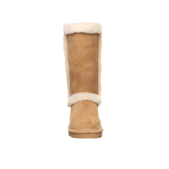 Tall tan suede boot with white shearling trim at the top and ankle