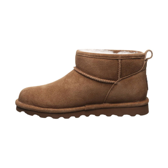 Brown suede ankle boot with shearling lining and a pull loop at the back