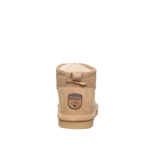 Tan suede ankle boot with faux fur lining and a stitched heel patch