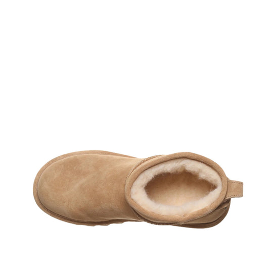 Tan suede ankle boot with cream shearling lining on a white background